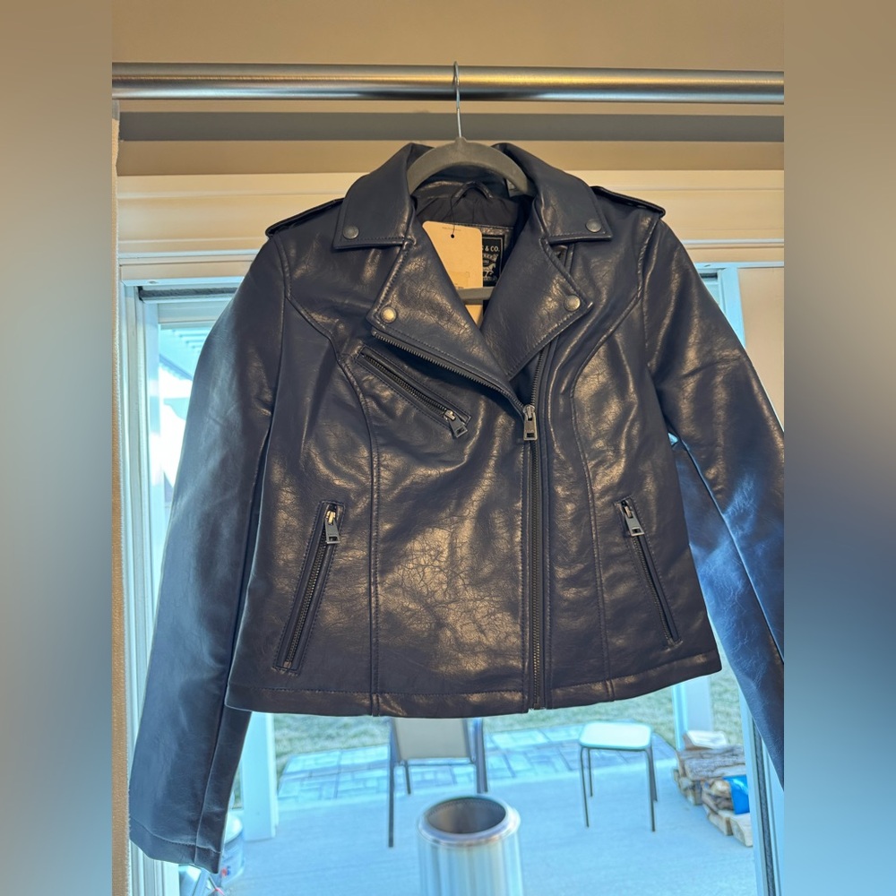 Brand new Levi navy leather jacket.  Size small. Tags attached.